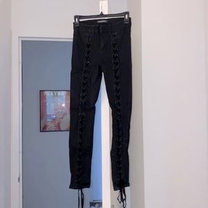 Black skinny lace up jeans